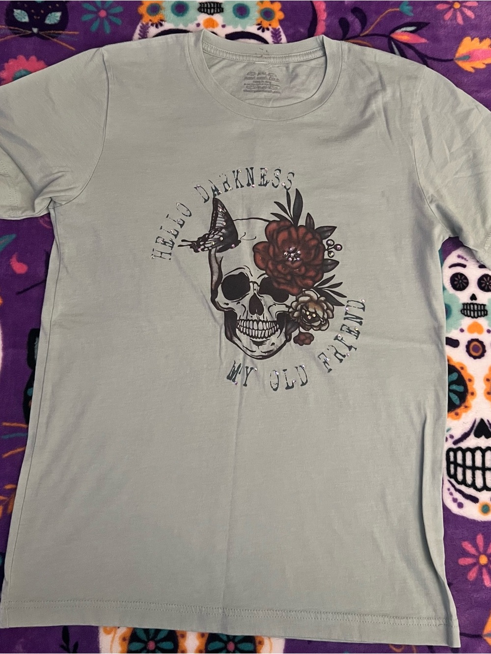 Light Green Graphic Tee with Skull & Flower Design